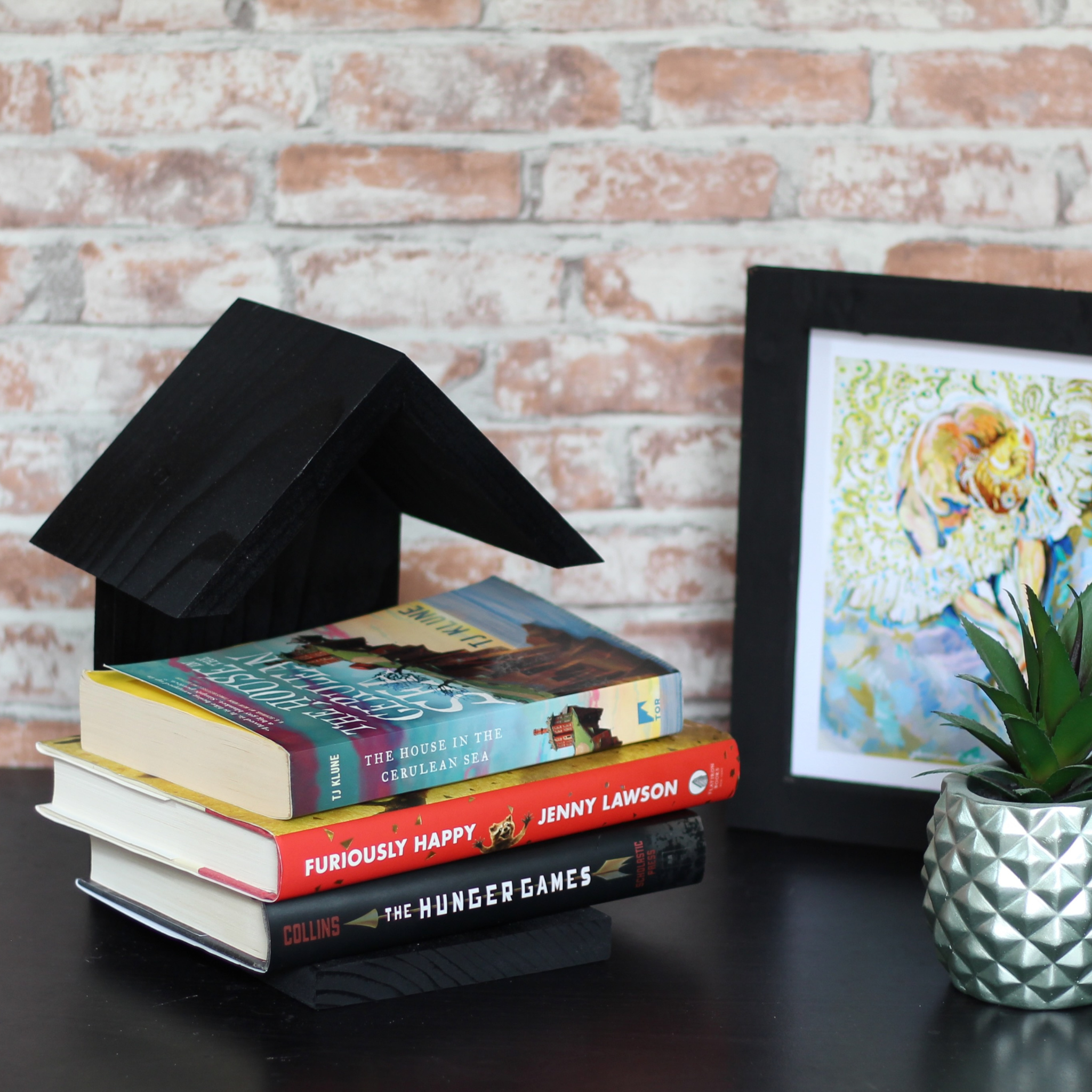 black modern wooden house shaped book holder with built in bookmark gift for book lovers 